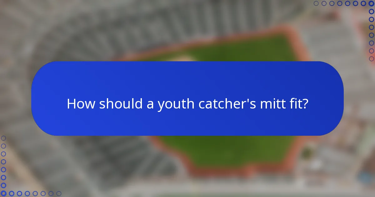 How should a youth catcher's mitt fit?